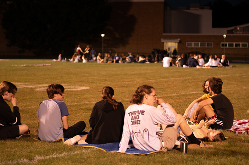 The class of 2025 gathers to watch the rising sun on their last first week of school